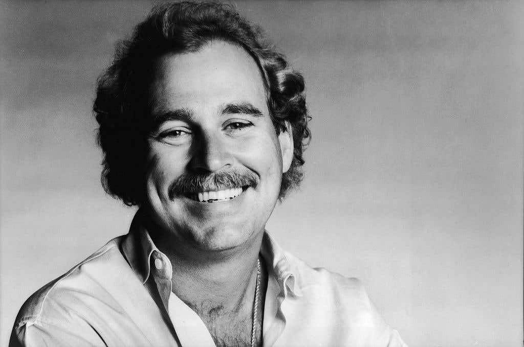 Portrait Of Singer Jimmy Buffett. This is a black and white photo that was used as a press photo, circa 1983