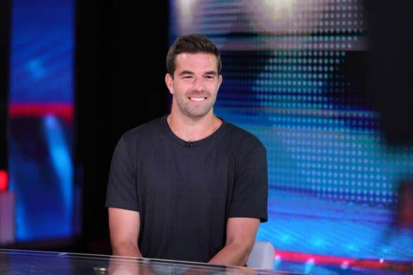 Billy McFarland wearing a black shirt on Jesse Watters Primetime. He's now selling tickets to Fyre 2.