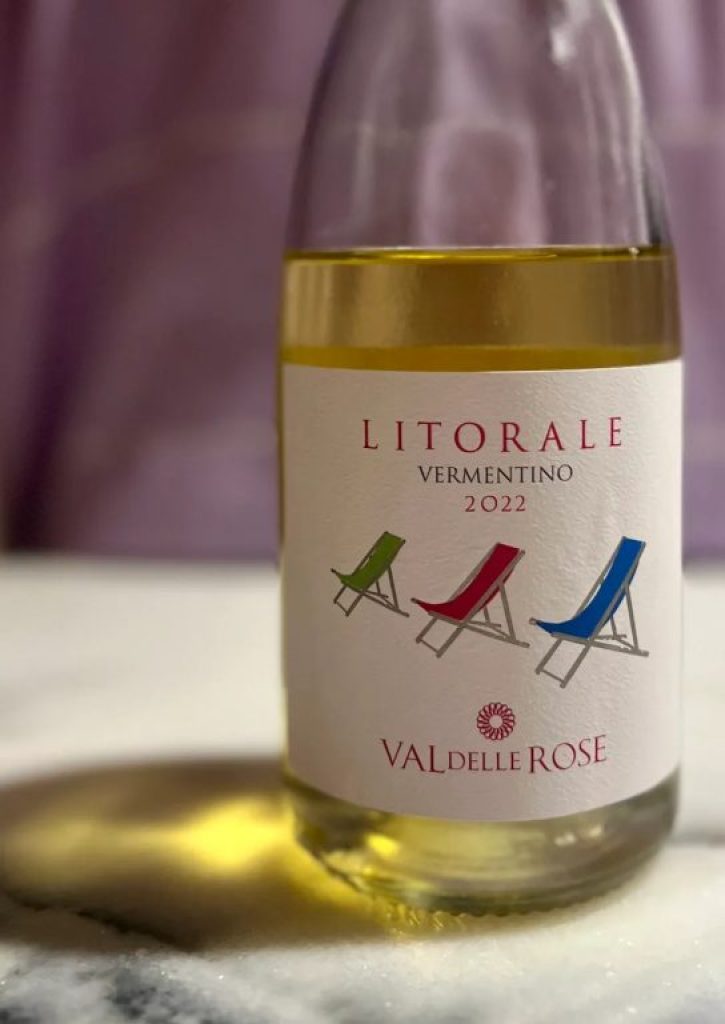 Bottle of Val delle Rose Litorale Vermentino with a reflection on the counter, Drink Vermentino this summer