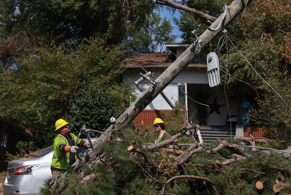 Linemen with MasTec work on restoring power after Hurricane Helene passed through the area, knocking out power to thousands of people on October 05, 2024 in North Augusta, South Carolina. The Hurricane has left over 200 people dead across Florida, Georgia, North Carolina, South Carolina, and Virginia. 