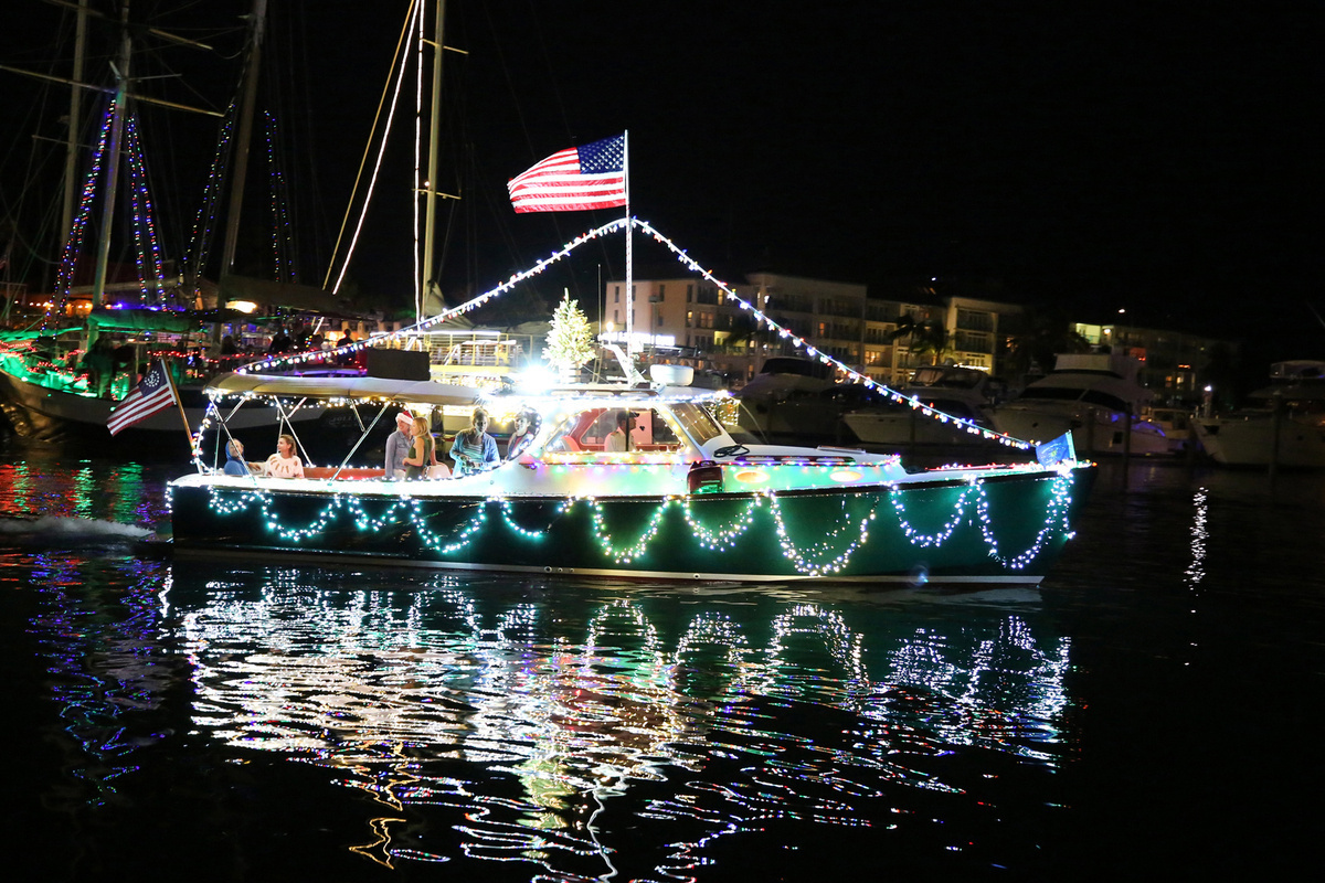 The M/V Havana Time parades through the Key West Historic Seaport during last year’s Schooner Wharf Bar/Absolute Vodka Lighted Boat Parade. This year’s maritime holiday spectacle is set for Saturday, Dec. 9. (Photo: Carol Tedesco/KeyWestHolidayFest.com)
